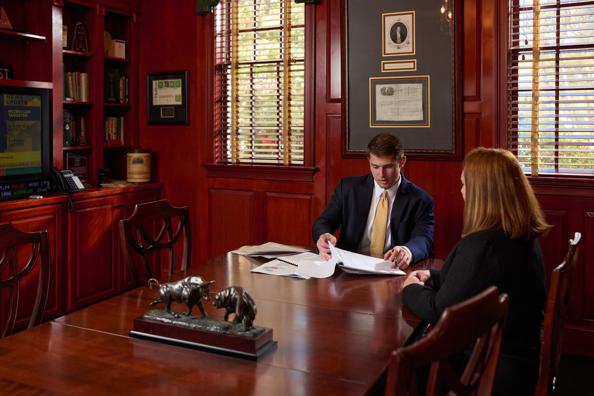 John Woodard III meeting with a client at the Woodard & Company office